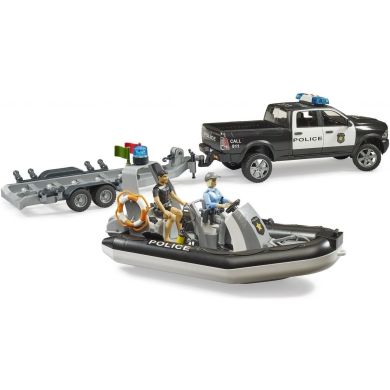 Набор игрушечный полицейский автомобиль RAM 2500 с лодкой и фигурками Bruder 02507